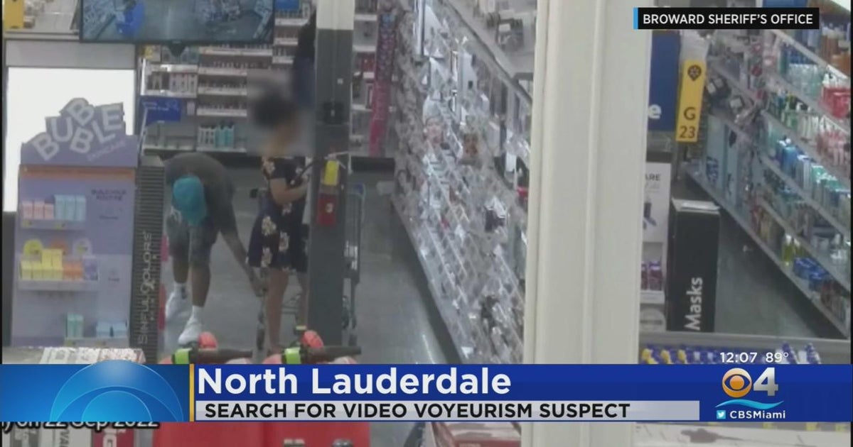 Man caught on camera placing phone under woman's dress in Broward