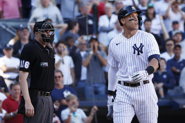 Aaron Judge #99 of the New York Yankees reacts after striking out swinging during the seventh inning against the Boston Red Sox at Yankee Stadium on September 24, 2022 in the Bronx borough of New York City. 