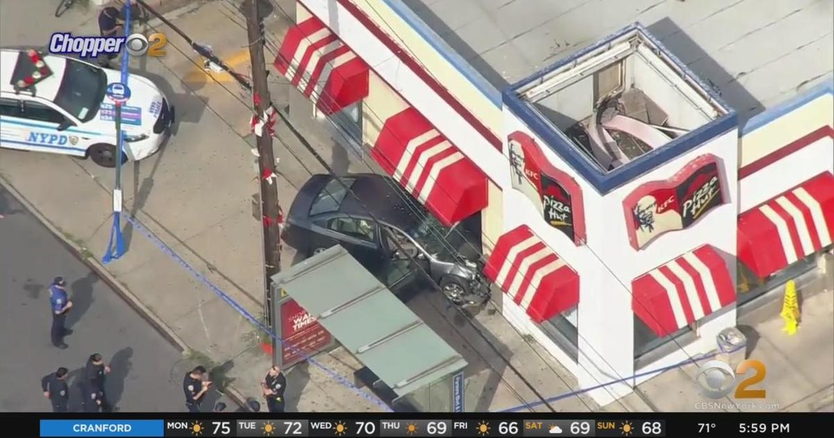 Suspect arrested after car crashes into Queens restaurant - CBS New York