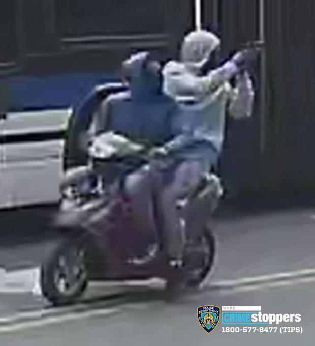 Surveillance photo of two suspects wanted in a stray bullet shooting in the Bronx. 