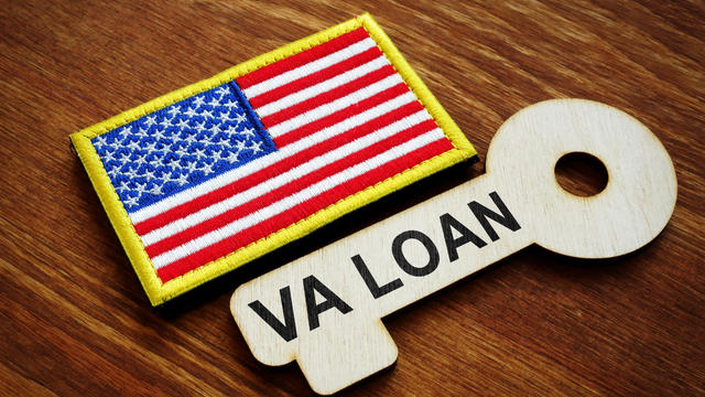 VA loan written on the wooden key. United States Department of Veterans Affairs. 