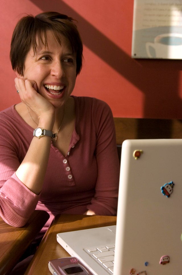 (bb) fe02csmyracle_bb_1 -- Author Lauren Myracle chats about her books, family and why she likes to write at her neighborhood coffee shop in Fort Collins, Colorado, February 19, 2008. (Brian Brainerd, The Denver Post)