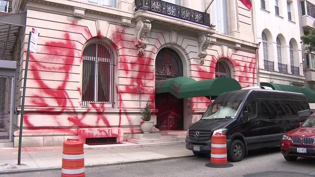 Red spray paint covers the front of the Russian Consulate on the Upper East Side. 