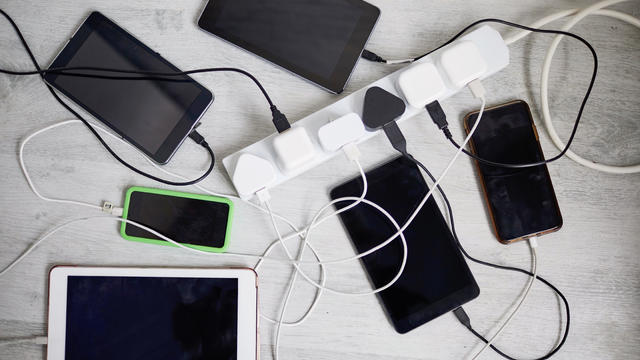 Digital devices plugged in to a extension lead 