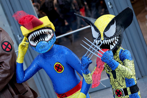 Symbiote Cyclops and Symbiote Wolverine pose during New York Comic Con 2022 on October 06, 2022 in New York City. 