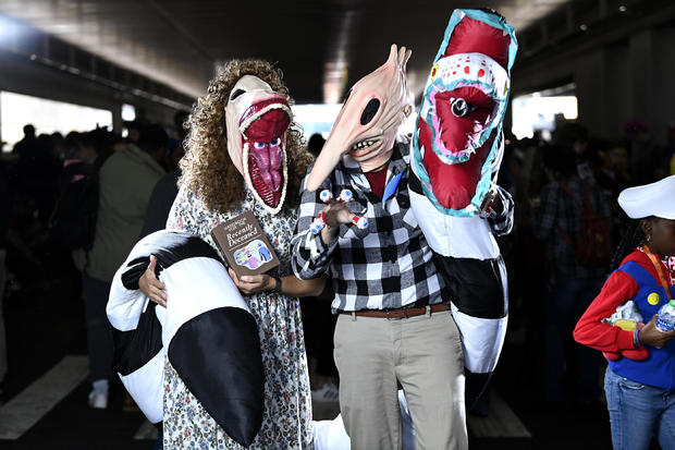 Barbara Maitland and Adam Maitland cosplayers pose during New York Comic Con 2022 on October 08, 2022 in New York City. 