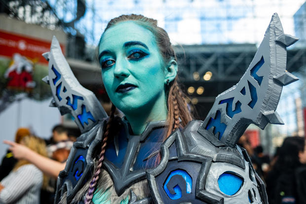 A woman dressed as Death Guard from "World Of Warcraft" poses at New York Comic Con 2022 on October 08, 2022 in New York City. 