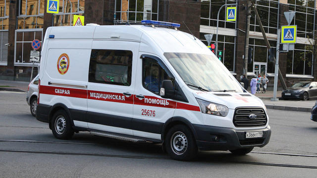 An ambulance drives along a street in St. Petersburg 