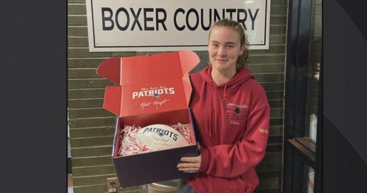 First female player to score a touchdown in Brockton High history receives signed ball from
