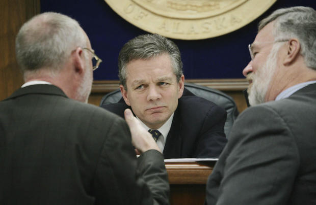Then-Alaska State Senate President Ben Stevens, a Republican representing Anchorage, center, and Sen. Gary Stevens, a Republican representing Kodiak, right, listen to Sen. Kim Elton, a Democrat representing Juneau, May 3, 2006, during a Senate floor session at the Capitol in Juneau. 