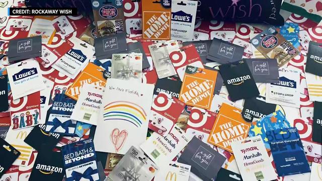 A pile of dozens of gift cards for various retailers, including Amazon, Home Depot, Bed Bath & Beyond and Target. 