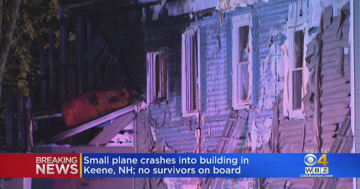 plane crashes into building