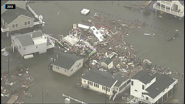 An aerial shot of damaged homes and extreme flooding caused by Superstorm Sandy in 2012. 