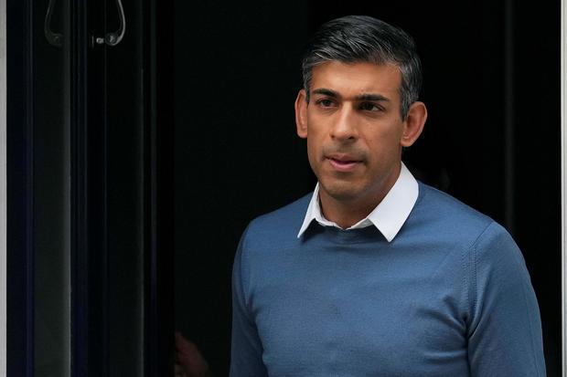 Conservative MP Rishi Sunak leaves his home address in London 