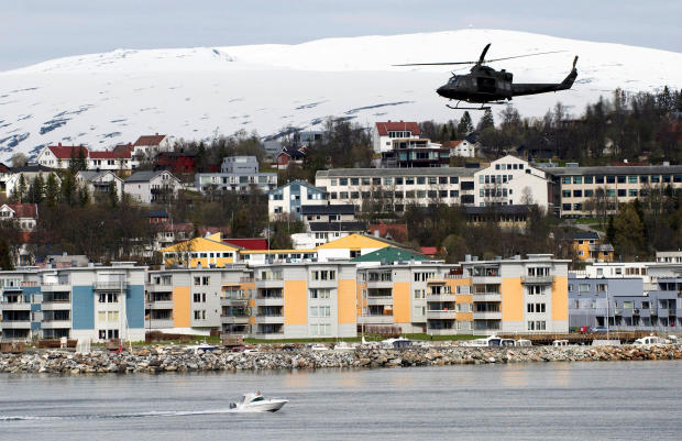 FILE PHOTO: A helicopter patrols off Tromsoe 
