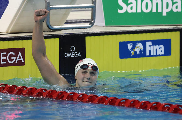Katie Ledecky of the United States of America celebrates after she wins the 1,500-meter freestyle in world-record time at the World Cup short course swimming finals at the Pan Am Sports Centre in Toronto, October 29, 2022. 
