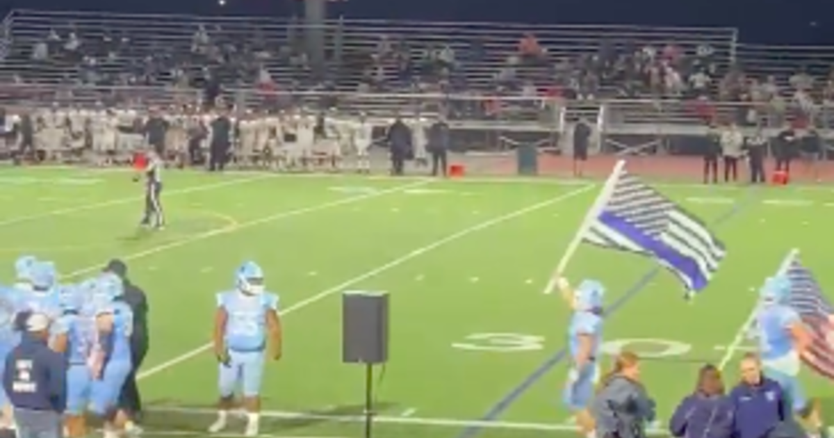 Controversy continues after Saugus High School players run 'Thin Blue Line'  flag onto field - CBS Los Angeles