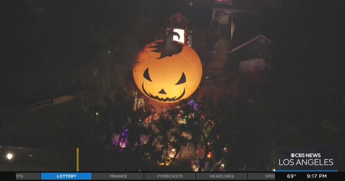 Sky9 flies over homed decked out in Halloween decorations in Toluca