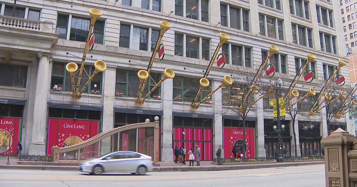 Holiday tree installation inside Macy