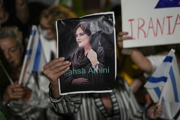 Women attend a protest against the death of Mahsa Amini, a woman who died while in police custody in Iran, during a rally in Tel Aviv, Israel, Oct. 29, 2022