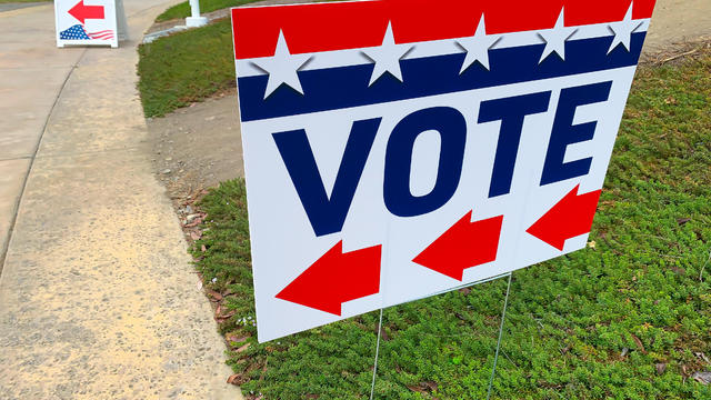 “Vote” directional sign 