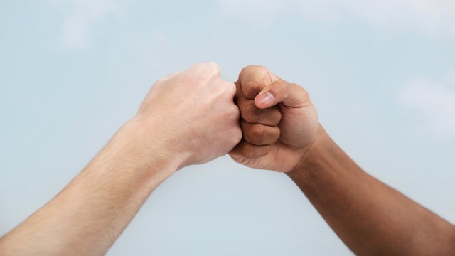 Fist bump greeting 