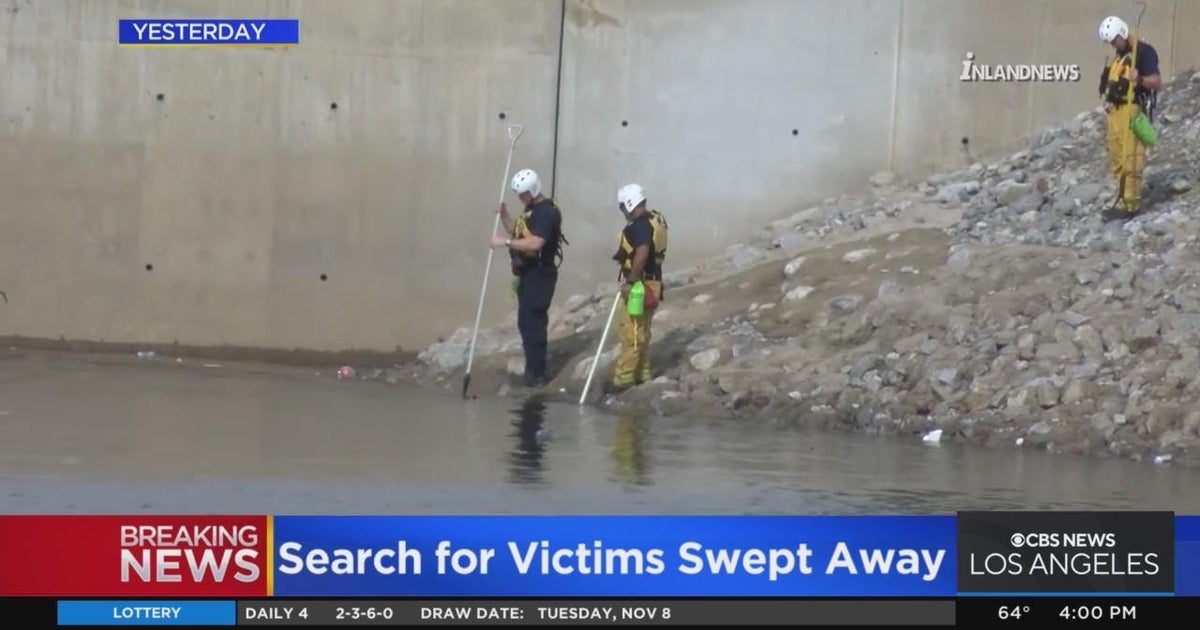 Rescue crews searching for multiple people swept away during flooding ...