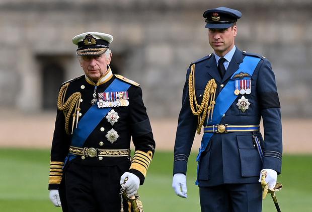 Britain's King Charles III and Britain's Prince William, Prince of Wales 