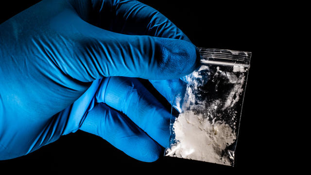Illegal fentanyl handled in a bag 