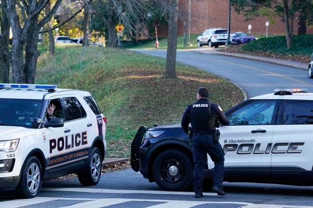 Police secure a crime scene of an overnight shooting at the University of Virginia, Nov. 14, 2022, in Charlottesville, Virginia.