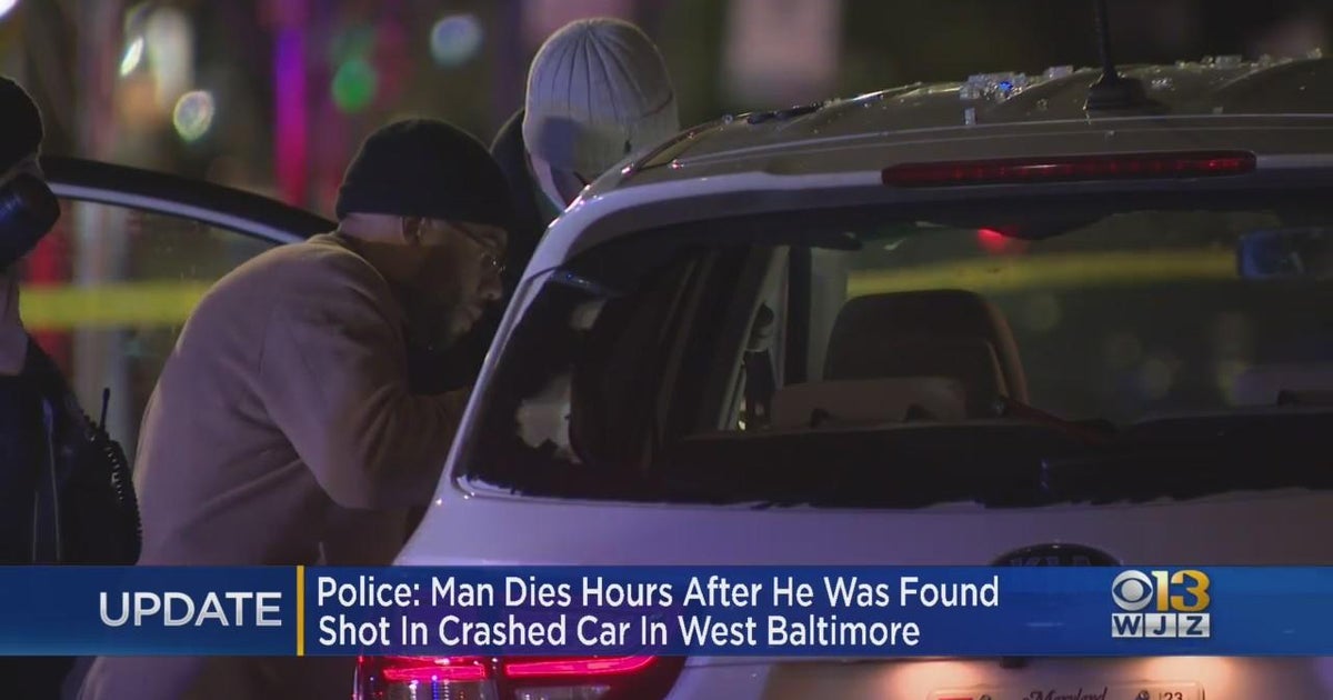 Man dies hours after he was found shot in crashed car in West Baltimore