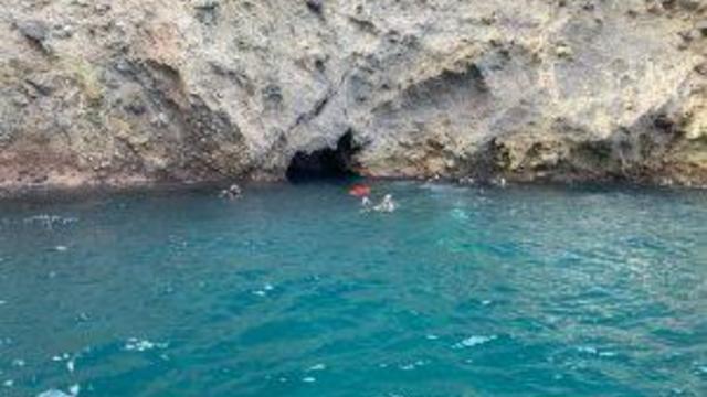 22-108-divers-at-mouth-of-cave-300x223.jpg 