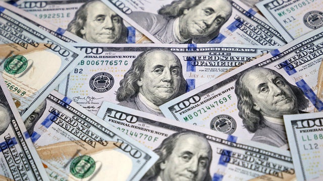 US dollars banknotes, paper currency for background 