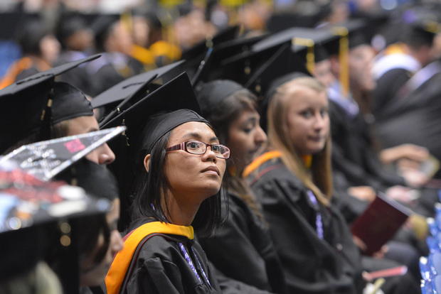 Hong Vu, a candidate for bachelor of science in nursing, waits with the other graduates. At the Santander Arena in Reading Saturday afternoon May 10. 2014 for the Alvernia University 2014 Spring Commencement. Photo by Ben Hasty 