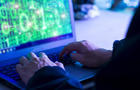 Dangerous Hooded Hacker Breaks into Government Data Servers and Infects Their System with a Virus. 