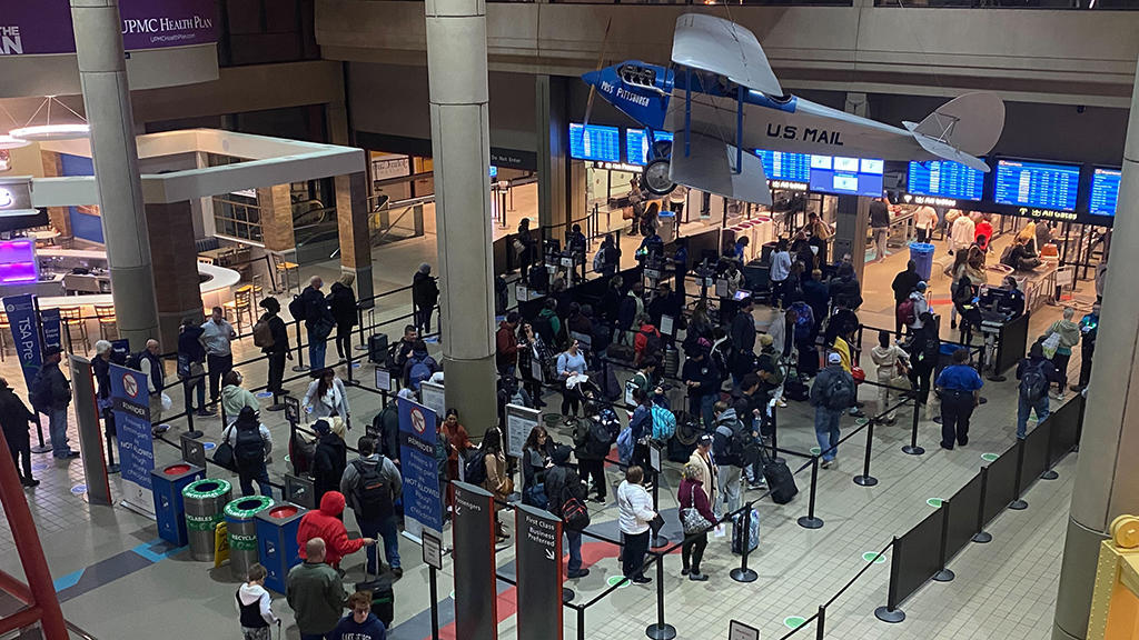 Pittsburgh International Airport issues a travel alert for long
security lines. Here's what you need to know.