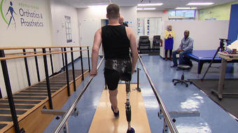 Helping a wounded Ukrainian soldier walk again 