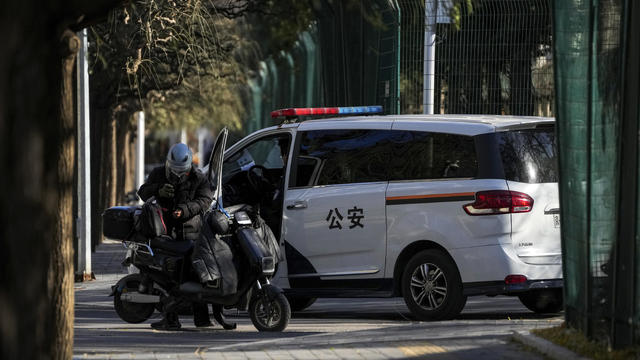China responds to rare protests with a security "crackdown"