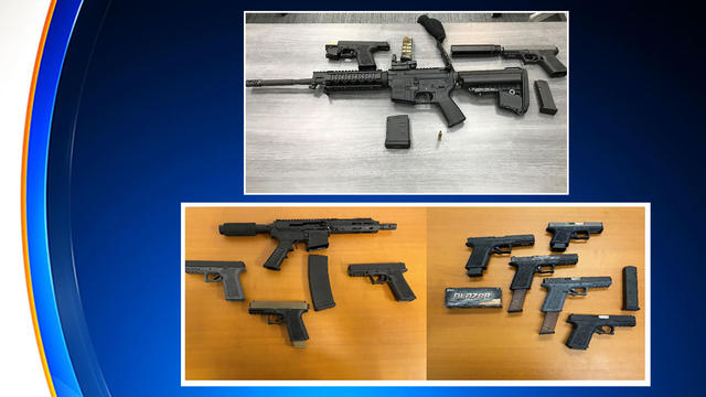 Some of the ghost guns, firearms, and accessories, including high-capacity magazine and silencers, recovered through a ghost gun trafficking takedown in New York. 