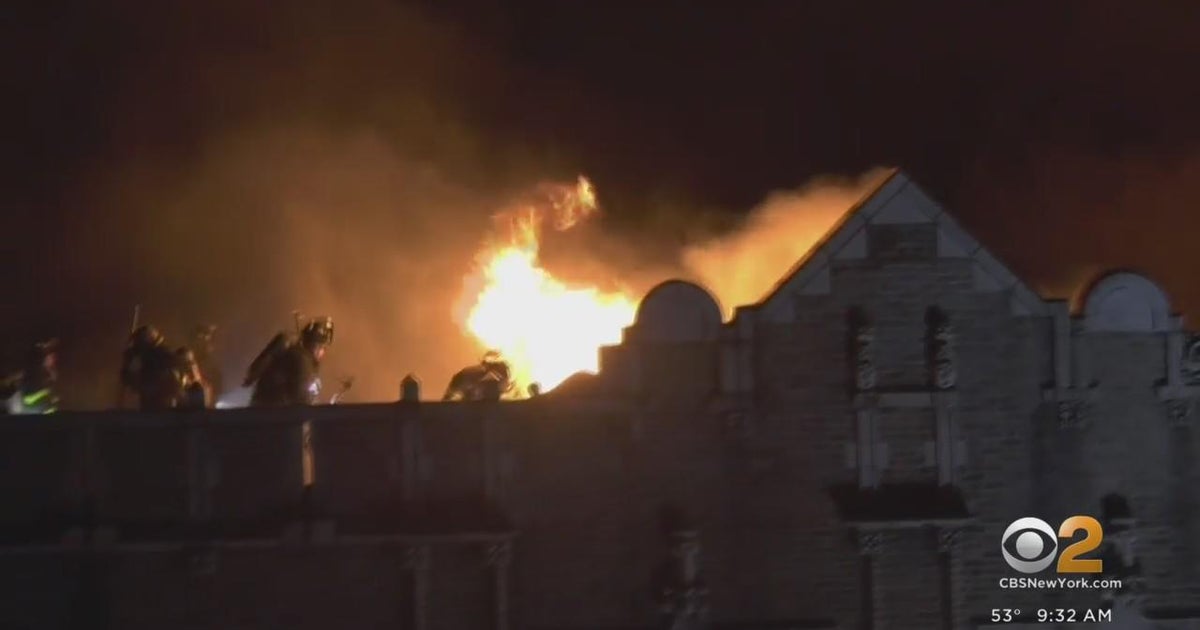 9 hurt as fire tears through Upper Manhattan apartment building - CBS ...