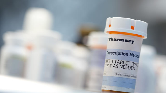 Prescription drug bottle on countertop 