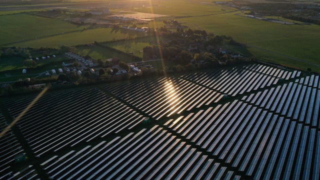 Solar farm alongside a village