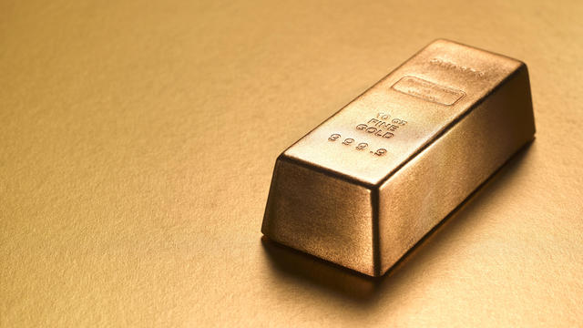 Gold ingot with gold copy space 