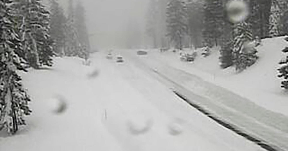 Snowstorm blankets Northern California, with hurricane-force winds and blizzard conditions reported