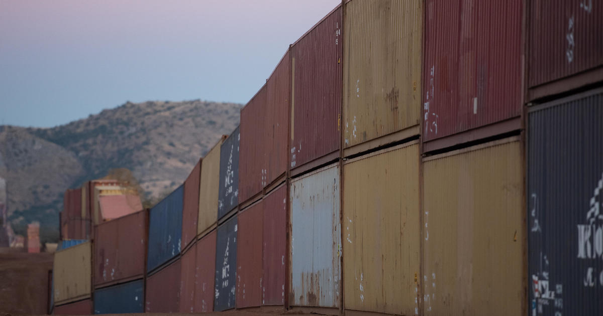 DOJ sues Arizona for installing cargo containers near the southern border