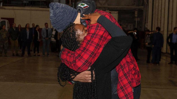 Brittney Griner embraces her wife, Cherelle Griner, after her release in a prisoner swap with Russia 