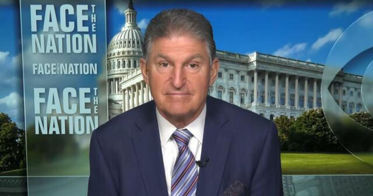 Manchin says "I have no intentions" of changing parties as of now