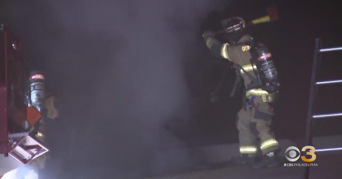 Firefighters battle fire at apartment building in Bucks County CBS