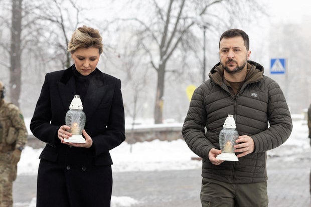 Ukraine's President Volodymyr Zelenskiy and his wife Olena attend a commemoration ceremony at a monument to the so-called "Heavenly Hundred", in Kyiv
