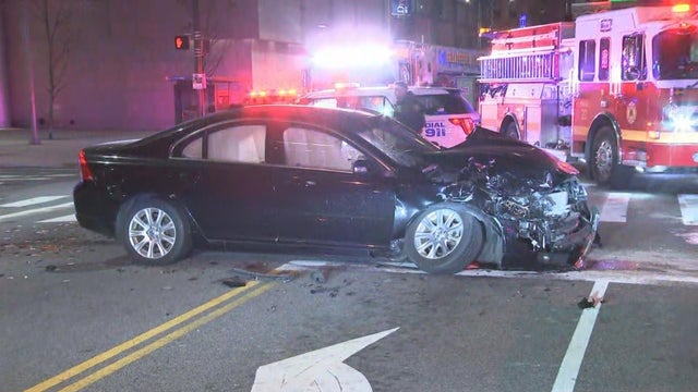 ambulance-crashes-into-building-after-two-vehicle-crash-2.jpg 